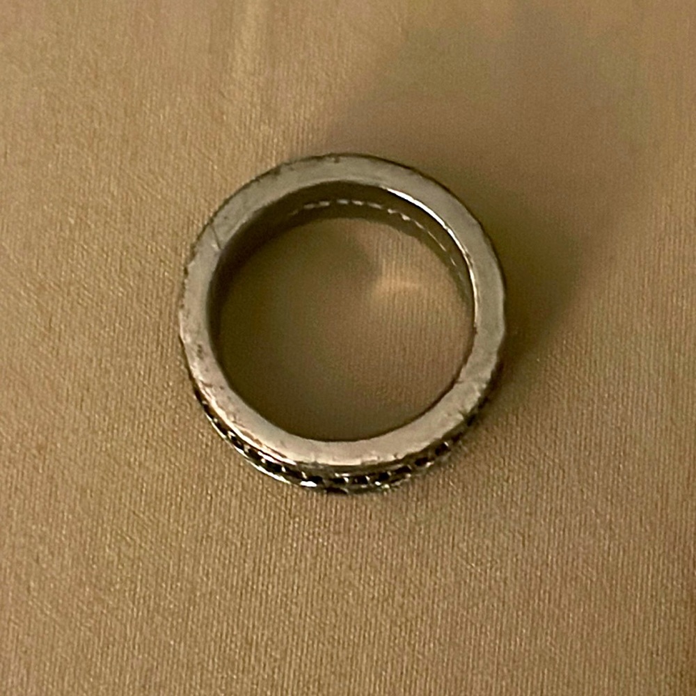 This is a Men’s Stephen Webster Silver Ring With Black Sapphire Metallic